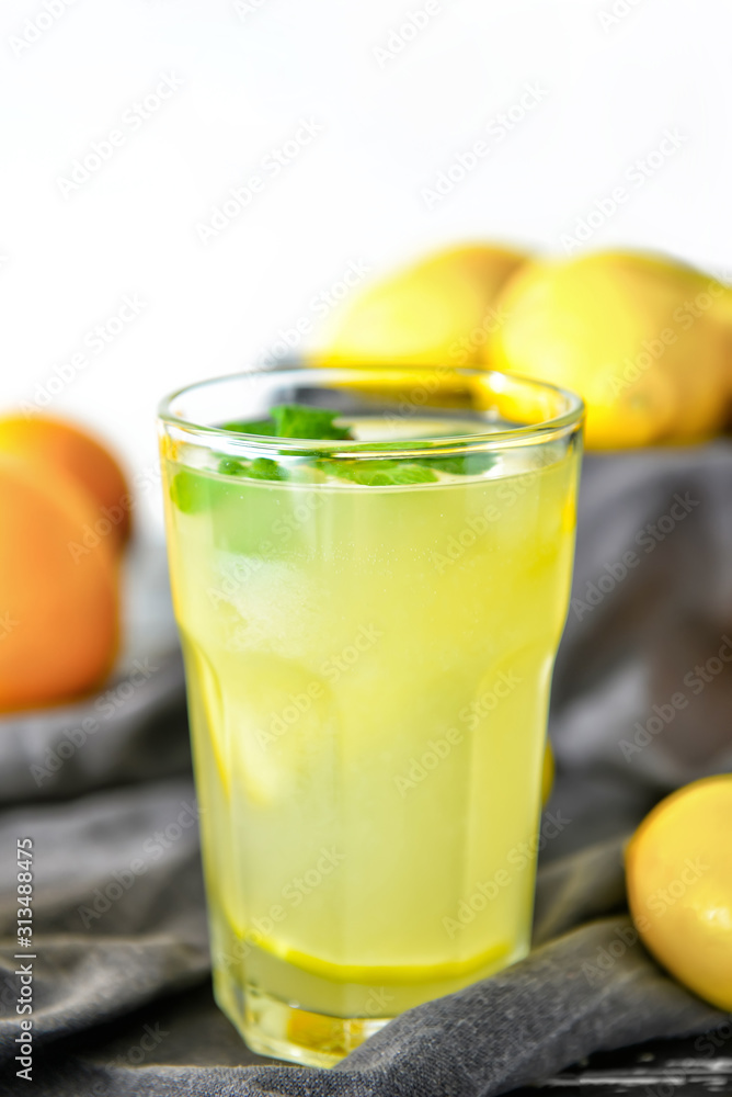 Glass of tasty lemonade on table Glass of tasty lemonade on table