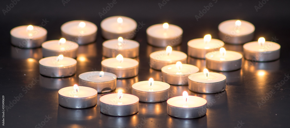 Many flaming candles