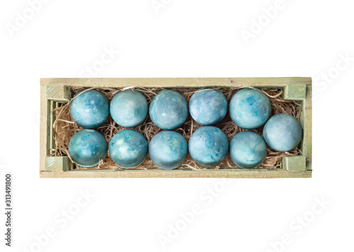 Easter eggs in a box isolated on a white background