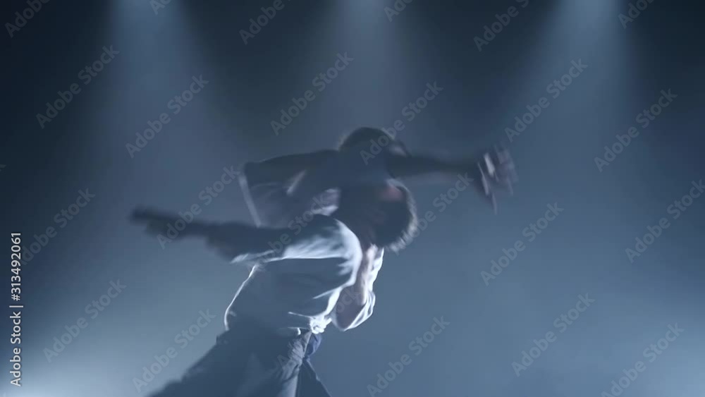 Fight between two aikido fighters in the dojo. Slow motion. Close up. Fight between two aikido fighters in the dojo. Slow motion. Close up.