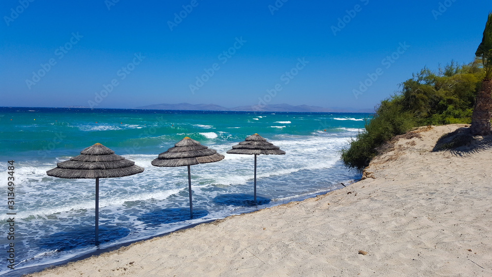 View of beach and waves in the sea, Greece View of beach and waves in the sea, Greece