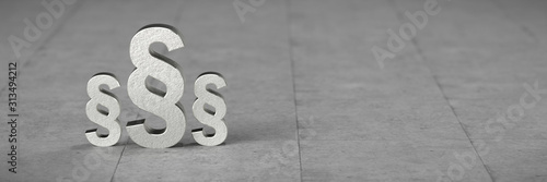 Tableau sur toile Paragraph symbols on concrete floor - 3D rendered illustration