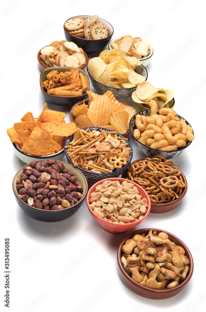 Fototapeta premium Salty snacks isolated on white