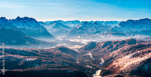 Mountain View from a Bavarian Top Point to the surrounding alp scenery during winter