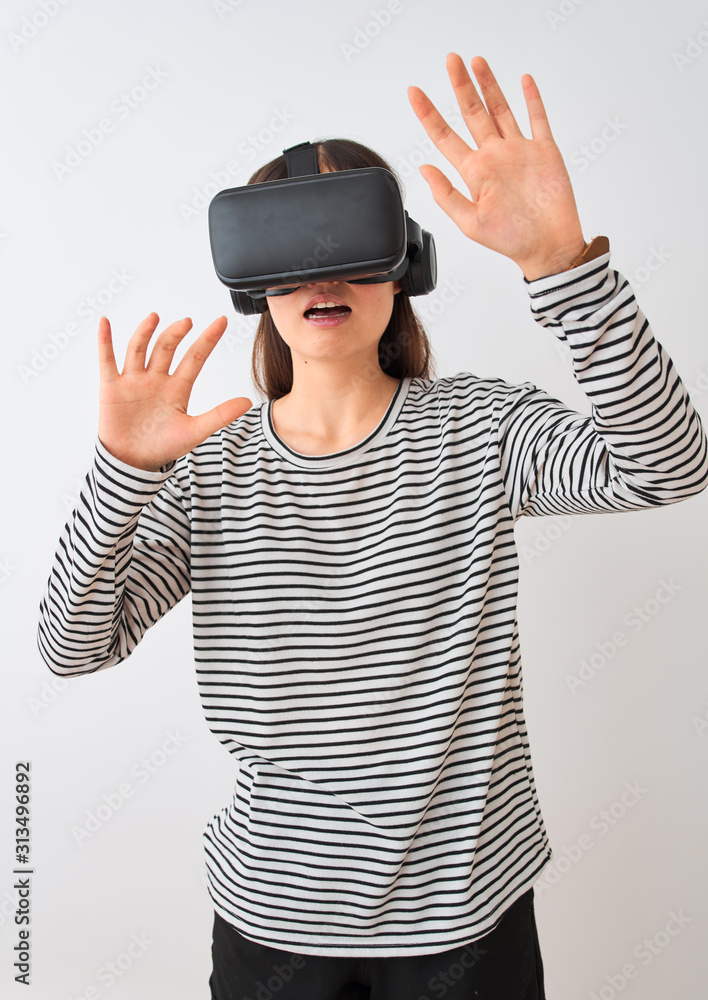 Young beautiful chinese woman playing virtual reality game using goggles Young beautiful chinese woman playing virtual reality game using goggles