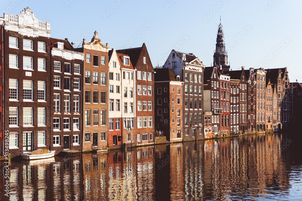 Traditional Dutch buildings at Damrak in Amsterdam, Netherlands