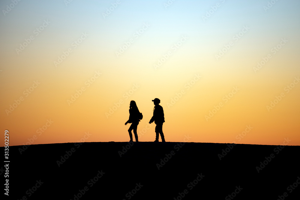 Two People Walking