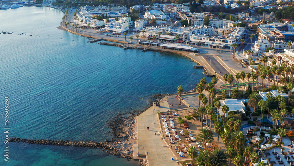 Aerial view of Paphos town in Cyprus. Paphos embankment or coastline with sea and hotels on seaside. Mediterranean resort concept.