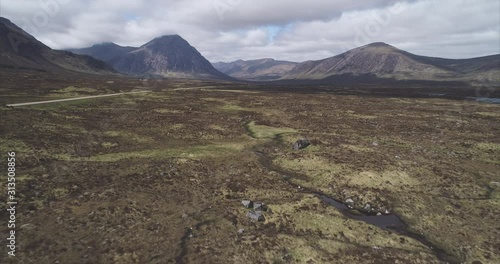 Aerial drone flight over landscape in the Scotland highlands photo