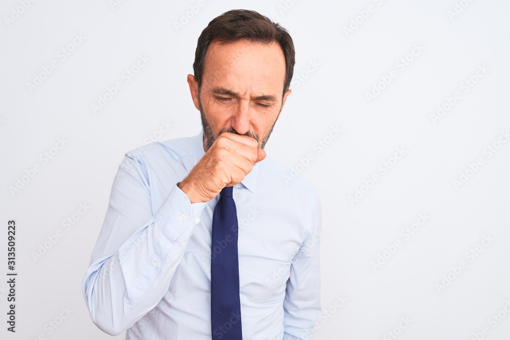 Middle age businessman wearing elegant tie standing over isolated white background feeling unwell and coughing as symptom for cold or bronchitis. Healthcare concept. Middle age businessman wearing elegant tie standing over isolated white background feeling unwell and coughing as symptom for cold or bronchitis. Healthcare concept.