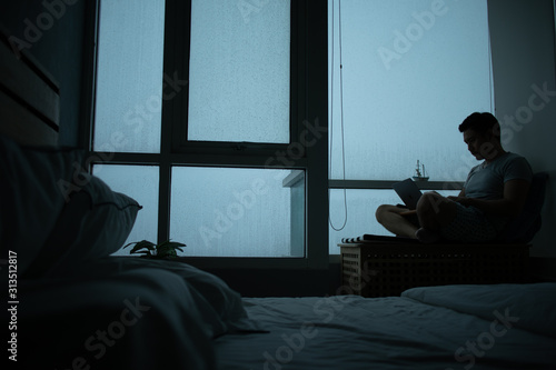 Sad vibe of a room with raining outside.