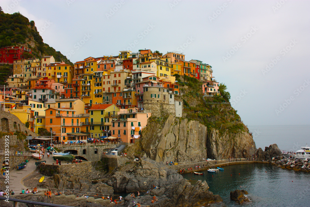 Monterosso village of the Cinque Terre of Liguria with houses perched on the cliff