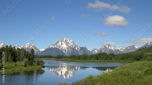 morning shot of the tetons at oxbow bend in wyoming
