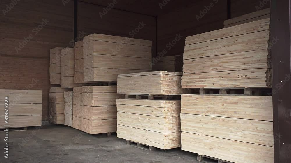 stacks of wooden boards stored in warehouse slow motion stacks of wooden boards stored in warehouse slow motion