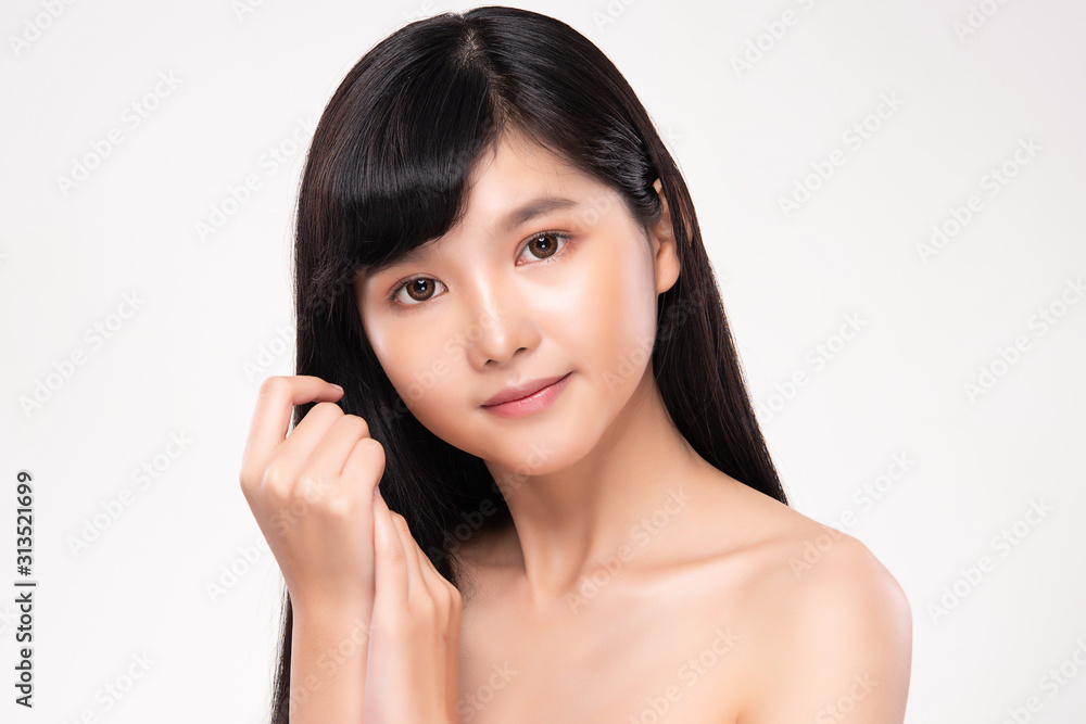 Beautiful Young Asian Woman with Clean Fresh Skin. Face care, Facial treatment, on white background, Beauty and Cosmetics Concept. Beautiful Young Asian Woman with Clean Fresh Skin. Face care, Facial treatment, on white background, Beauty and Cosmetics Concept.