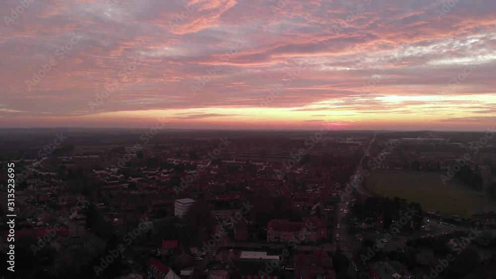 Sunset view from a drone with few birds flying in the sky Sunset view from a drone with few birds flying in the sky