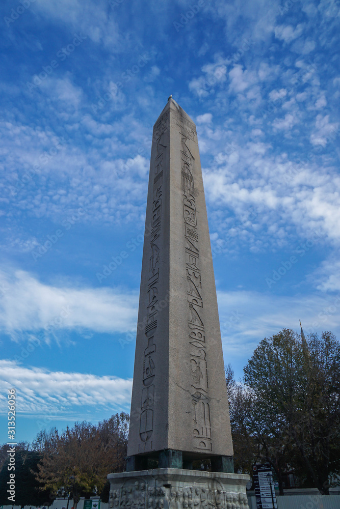 Istanbul / Turkey - December 10 2019: the Obelisk of Egyptian Pharaoh Thutmosis III in Istanbul's Sultanahmet Square for tourist attraction