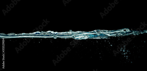 water wave isolated on black background.