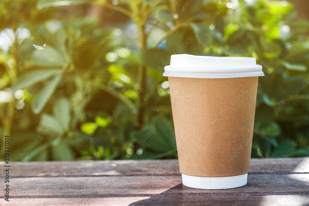 Recycle paper coffee cup in garden coffee cafe Recycle paper coffee cup in garden coffee cafe