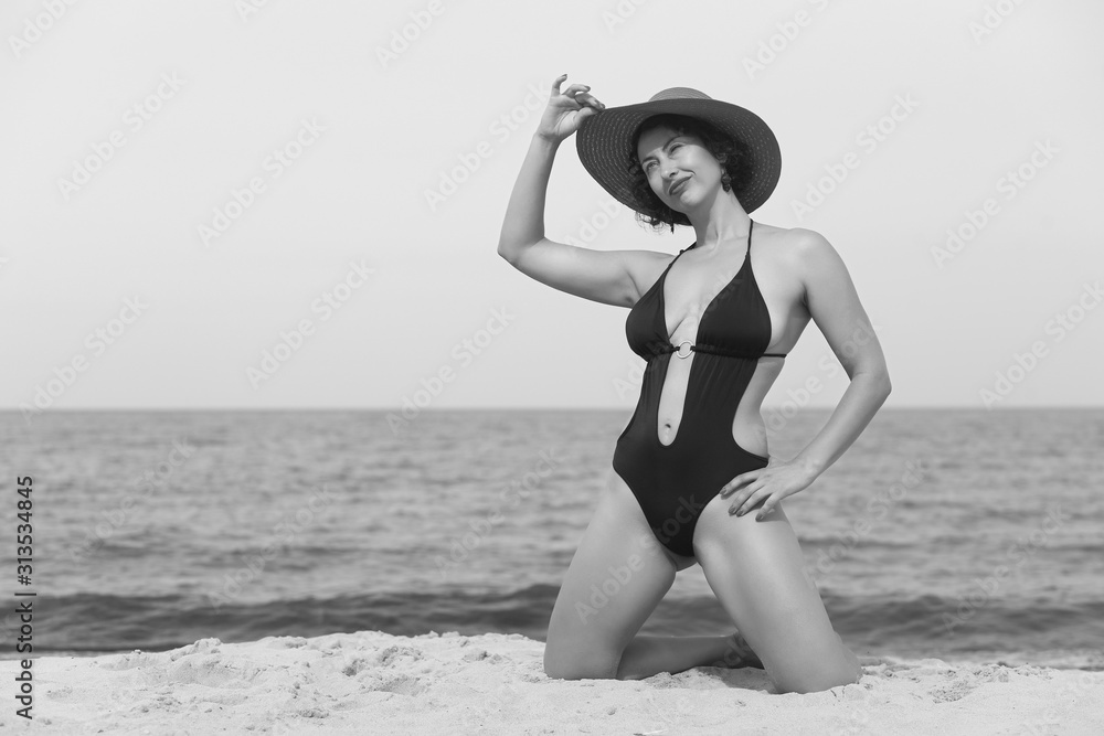 young girl on the beach in swimsuit young girl on the beach in swimsuit