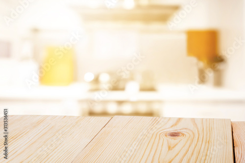 Perspective empty wooden table on top over blur background  can be used mock up for montage products display or design layout.