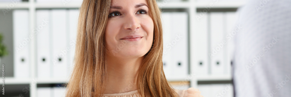 Beautiful smiling cheerful girl at workplace Beautiful smiling cheerful girl at workplace