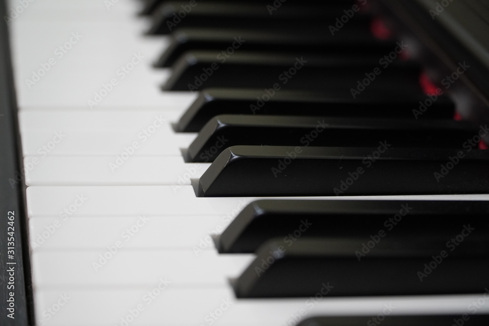 Electric piano keyboard background with close-up focus Electric piano keyboard background with close-up focus
