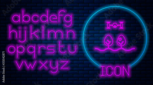 Glowing neon Smart farm with drone control and tree icon isolated on brick wall background. Innovation technology for agricultural company. Neon light alphabet. Vector Illustration