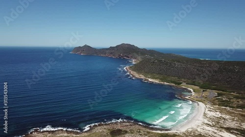 4K summer day aerial drone video: spectacular Bordjiesrif beach at Vasco Da Gama Cross. Cape of Good Hope, most popular tourist attraction, near Cape Town in Cape Peninsula, Western Cape, South Africa photo