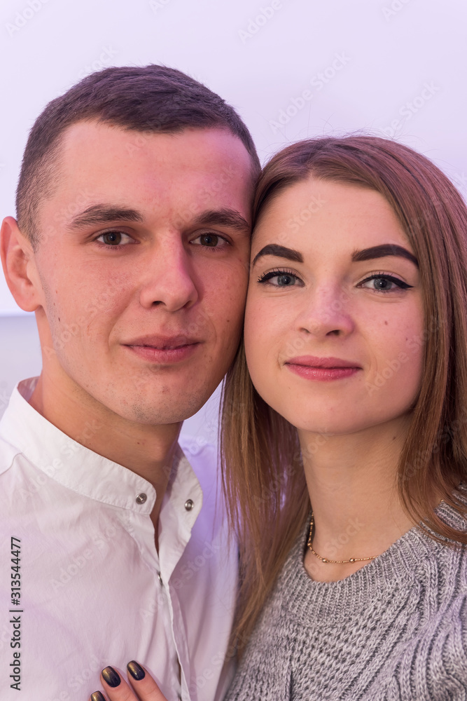 Couple in love posing hugging. Valentines day. Passion and feelings between young people Couple in love posing hugging. Valentines day. Passion and feelings between young people