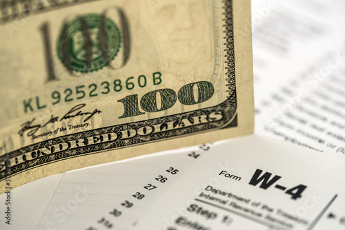 US tax form w4  w9 with money.