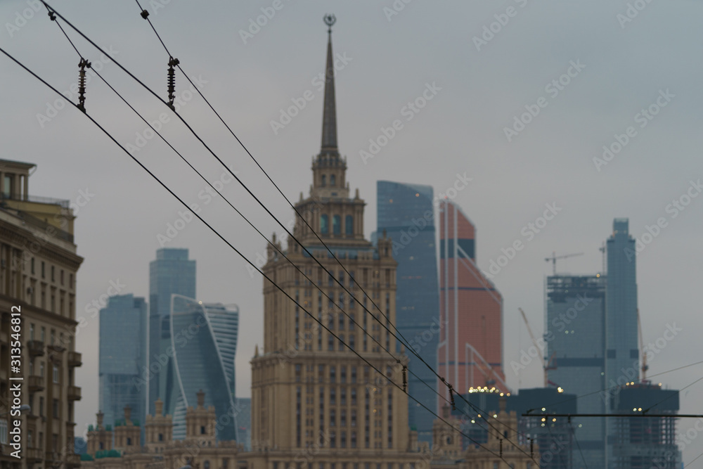 Downtown cityscape. Residential, business offices skyscrapers of Moscow International Business Center, Hotel Ukraine (Radisson Royal Hotel) in Stalinst architecture. High angle view. Telephoto lens