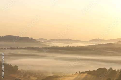 Morning mist covered by trees at Khao Takhian Ngo Phetchabun in Thailand