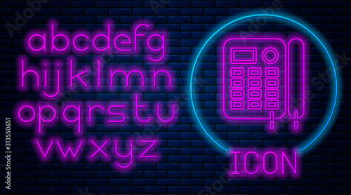 Glowing neon Telephone icon isolated on brick wall background. Landline phone. Neon light alphabet. Vector Illustration