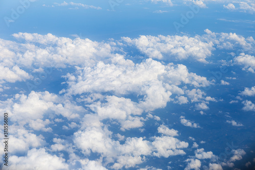 On top of the white cloud, haven, white cloud floating on the air, nature concept background, view from airplane © sirirak