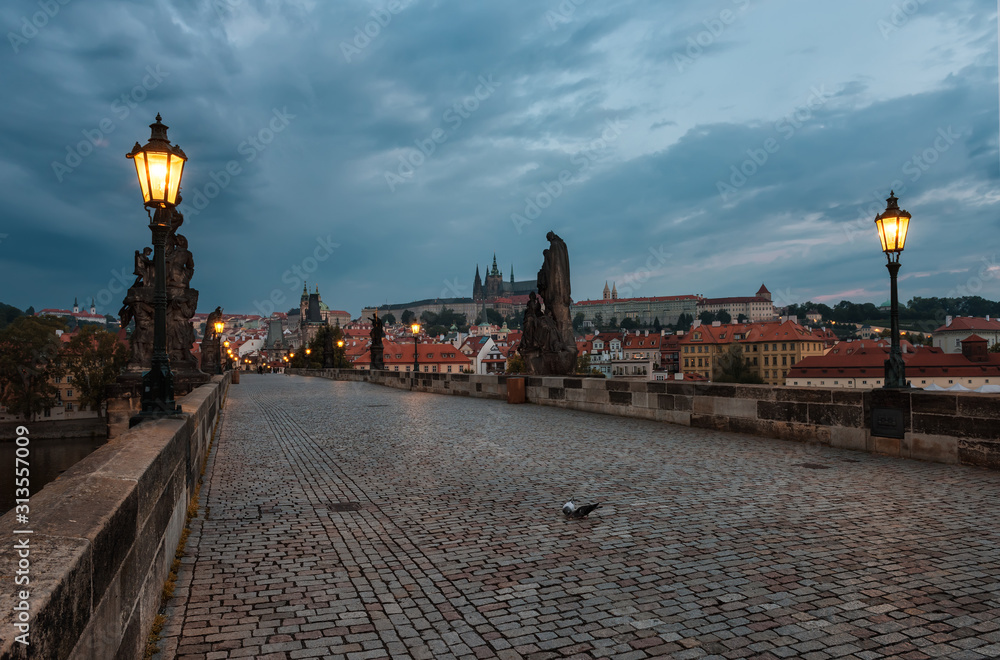 An amazing view before sunrise of Charles Bridge in Prague, Czech Republic