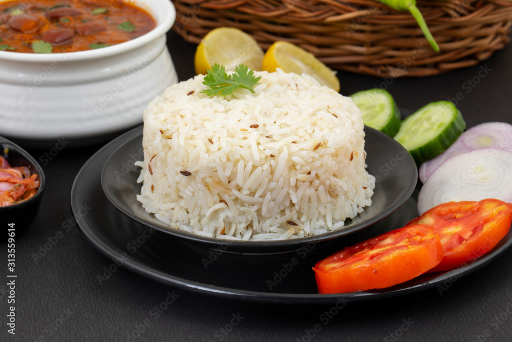 Rajma Chawal or Rajma Jeera Chawal (Rice) is a Traditional North Indian Food, Consisting of Cooked Red Kidney Beans in a Thick Gravy with Spices. Served with Jeera Rice Rajma Chawal or Rajma Jeera Chawal (Rice) is a Traditional North Indian Food, Consisting of Cooked Red Kidney Beans in a Thick Gravy with Spices. Served with Jeera Rice
