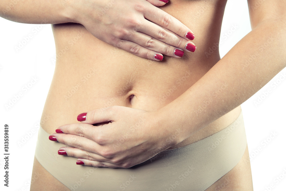 Female belly and hands isolated on a white