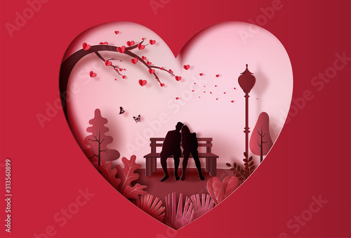 Young couple in love sitting on a bench in park, paper art style.