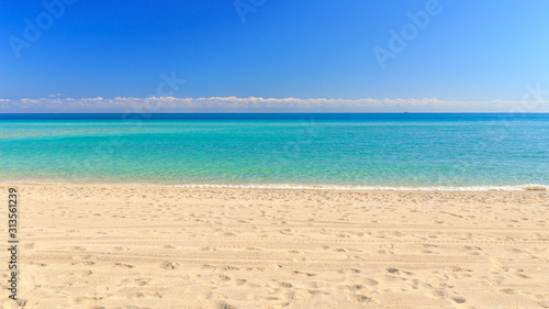 Just ocean beach and blue sky