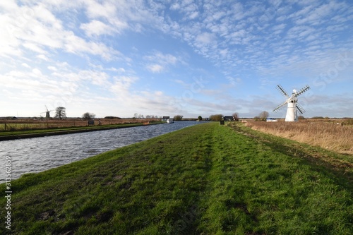White windmill at Thurne, on the Norfolk Broads, England, UK.