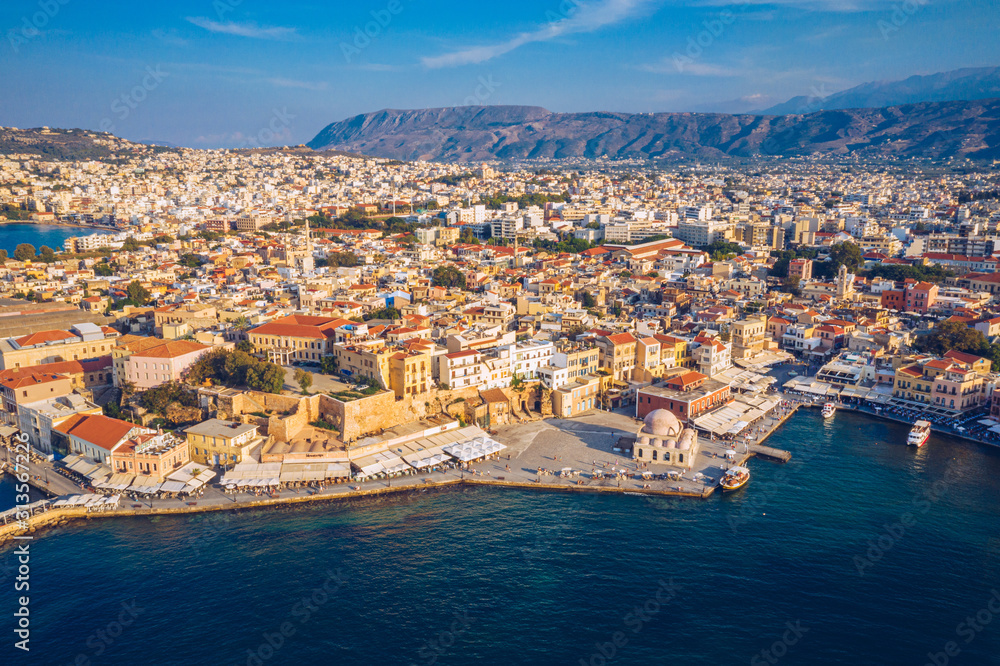 Panoramic aerial view from above of the city of Chania, Crete island, Greece. Landmarks of Greece, beautiful venetian town Chania in Crete island. Chania, Crete, Greece. Panoramic aerial view from above of the city of Chania, Crete island, Greece. Landmarks of Greece, beautiful venetian town Chania in Crete island. Chania, Crete, Greece.