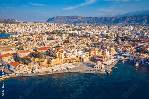 Panoramic aerial view from above of the city of Chania, Crete island, Greece. Landmarks of Greece, beautiful venetian town Chania in Crete island. Chania, Crete, Greece.