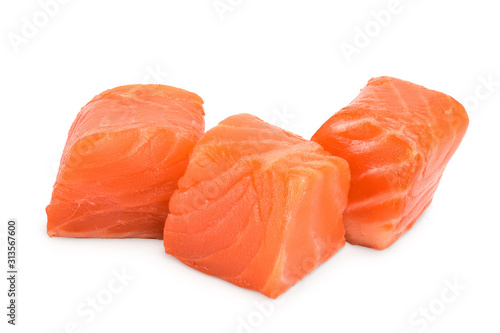 raw salmon piece cube isolated on white background close up