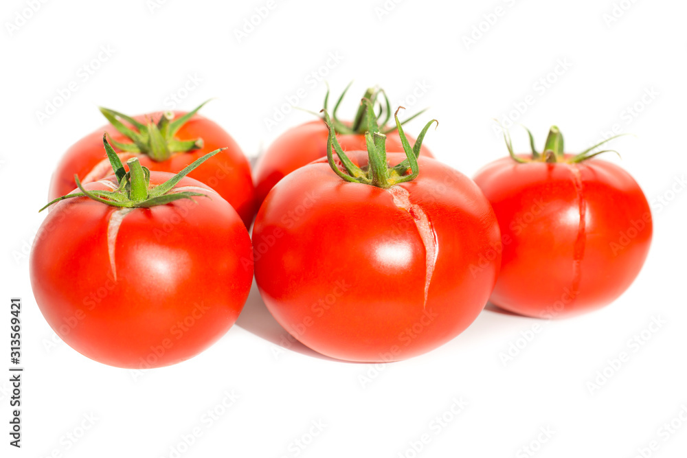 Group of red fresh tomatoes isolated on white background Group of red fresh tomatoes isolated on white background