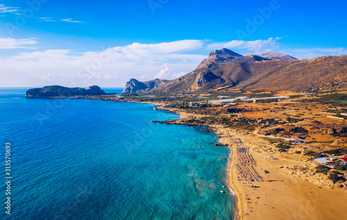Aerial shot of beautiful turquoise beach Falasarna  Falassarna  in Crete  Greece. View of famous paradise sandy deep turquoise beach of Falasarna  Falassarna  in North West  Crete island  Greece.