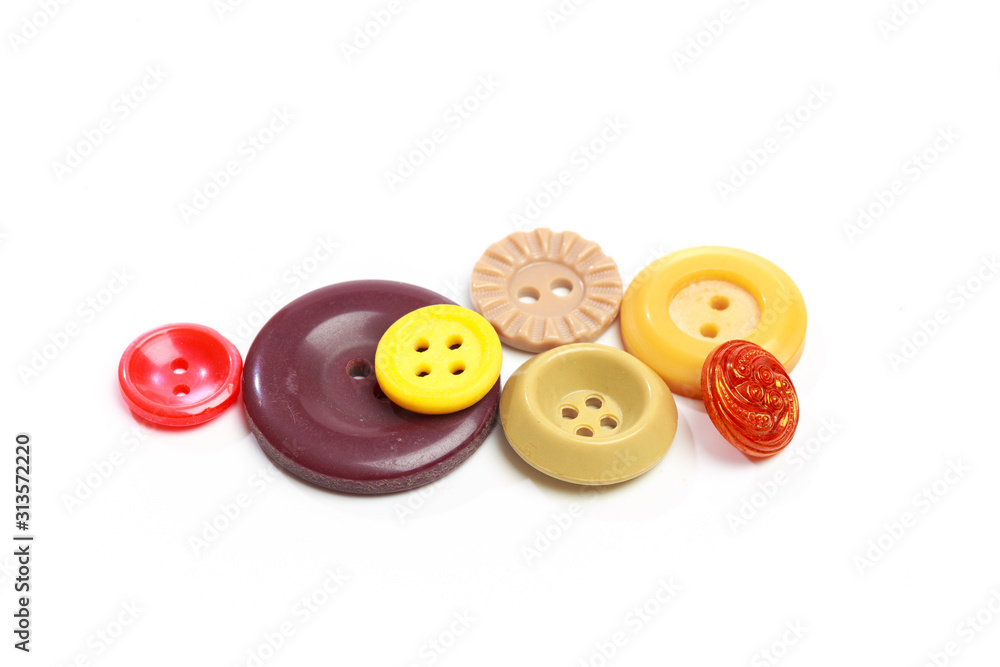 Fototapeta premium Buttons for clothes on white background using for concept of Button Day. - Image