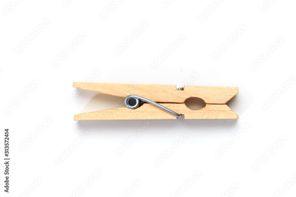 Brown wood clothes peg or clothespin on white background. - Image Brown wood clothes peg or clothespin on white background. - Image