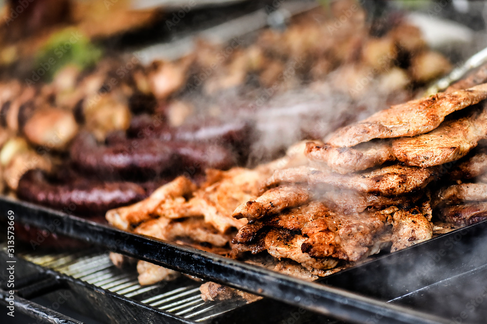 Chicken grilled breasts. Heap of chicken breast roasted on grill. Chicken grilled breasts. Heap of chicken breast roasted on grill.