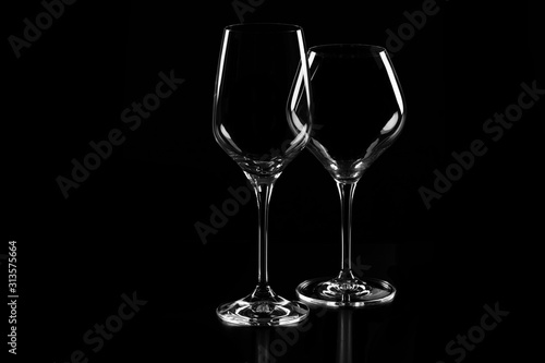 empty wine glasses on black background
